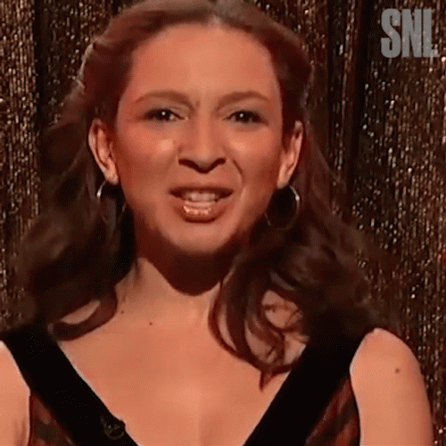 Entertaining Maya Rudolph Winking GIF