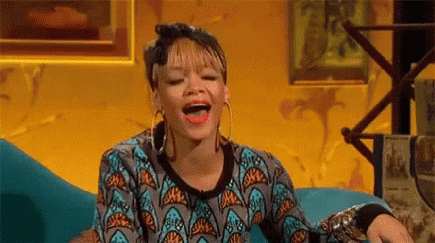 Entertaining Rihanna Funny Winking GIF
