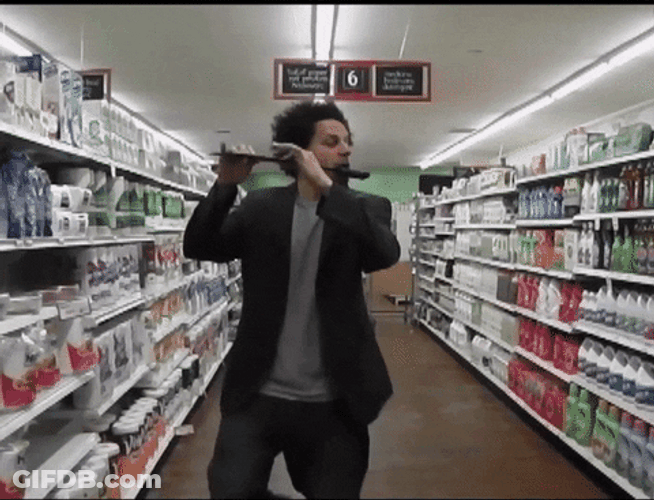 Eric Andre Let Me In Flute In Grocery GIF