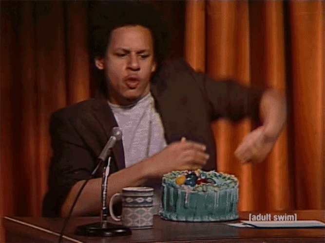 Eric André Slicing Cake GIF