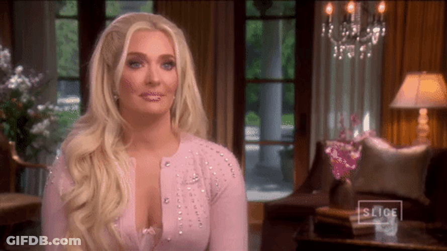 Erika Jayne Nonchalant Shoulder Brush GIF