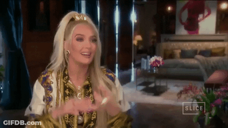 Erika Jayne Shoulder Shrug GIF