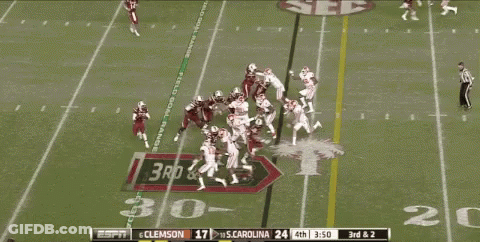 Espn Is Showing A Football Game Between Clemson And S. Carolina GIF