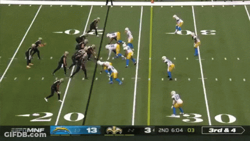 Espn Mnf Is Showing A Football Game Between The Chargers And The Saints GIF