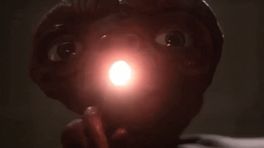 Et Has A Light On His Hands GIF