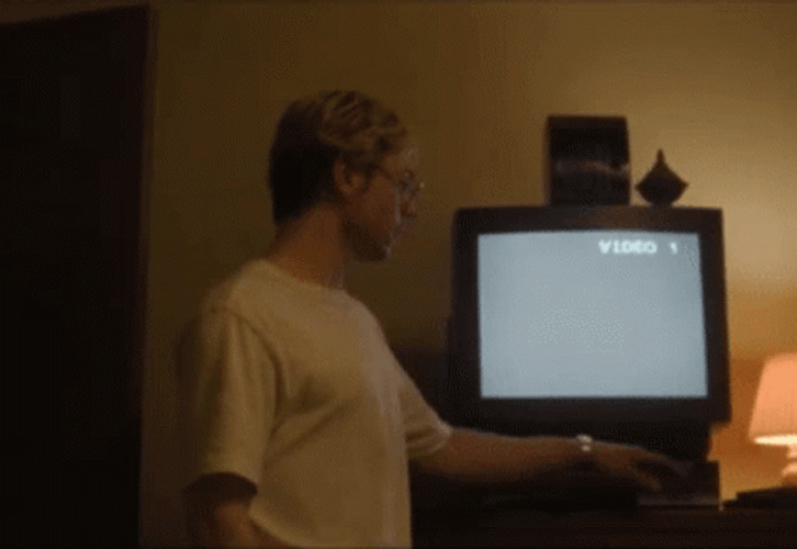 Evan Peters Dahmer Turning Old Tv On GIF