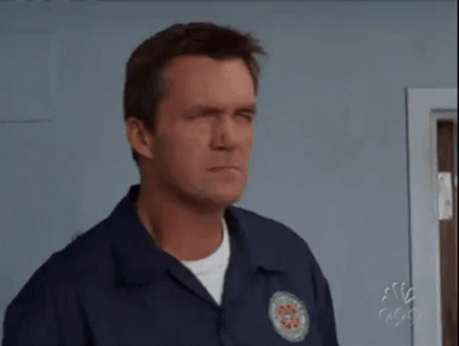 Evil Eye Squint Janitor Scrubs GIF