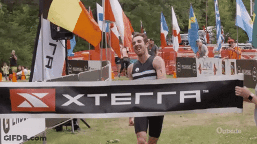 Excited Athlete Finish Line Win GIF