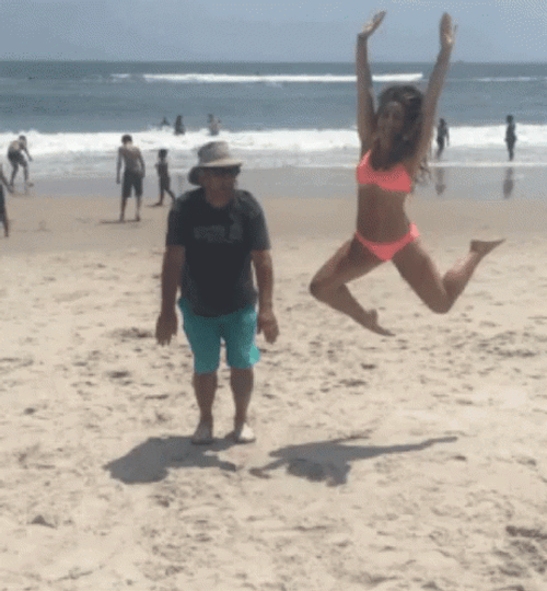 Excited Beach Couple GIF