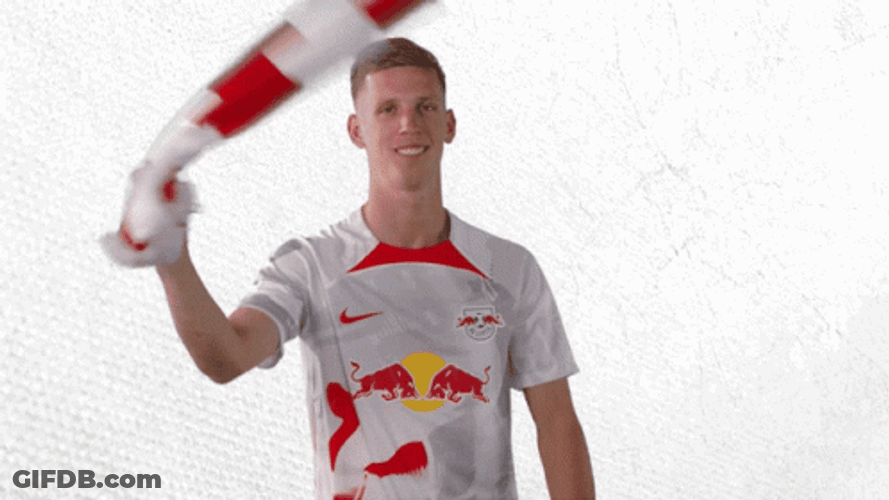 Excited Dani Olmo Twirling Jersey GIF