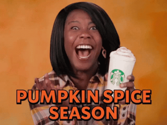 Excited Woman Holding Cup Of Psl GIF