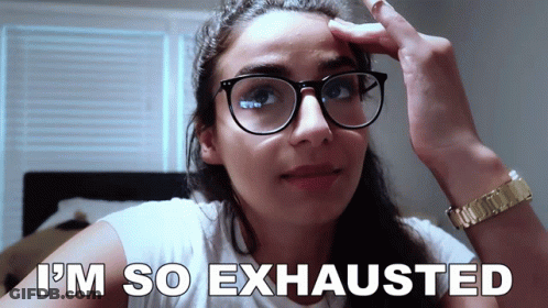 Exhausted Woman Wearing Glasses GIF