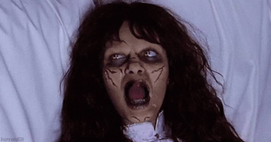 Exorcist Licking Tongue Gesture GIF