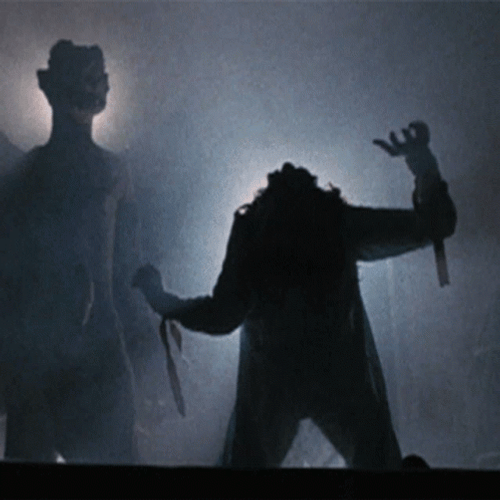 Exorcist Possessed Regan Raising Hands GIF