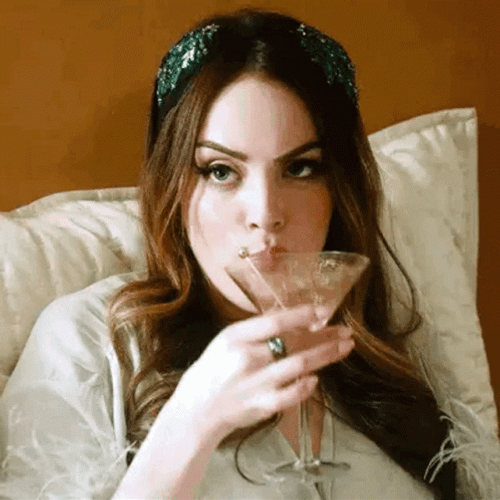 Eyebrow Raise Elizabeth Gillies Drinking GIF