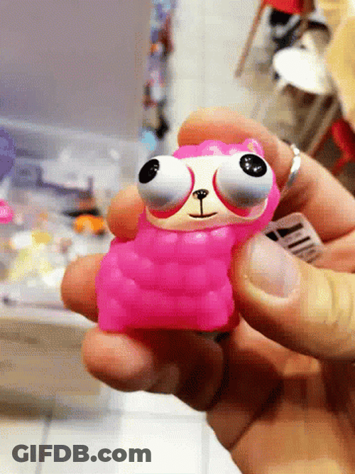 Eyes Popping Out Pink Toy GIF