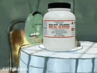 F & C Dye Colorant Bottle On White Barrel GIF