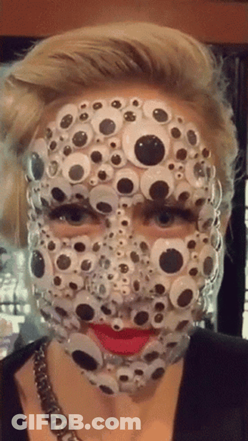 Face Full Of Googly Eyes GIF