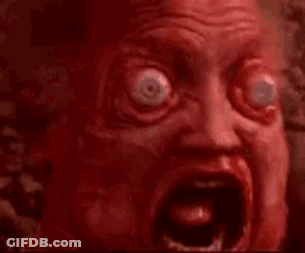 Face With Scary Eyeball GIF