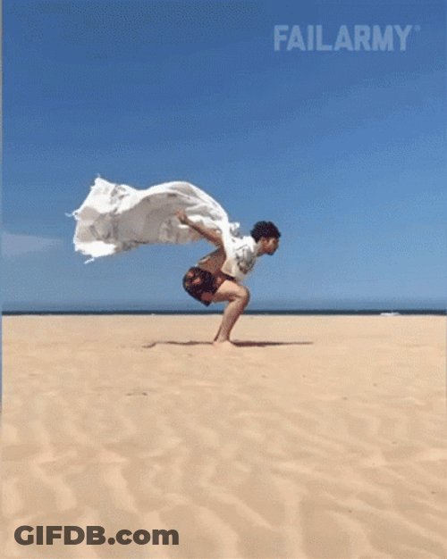 Failed Backflip In The Sand GIF