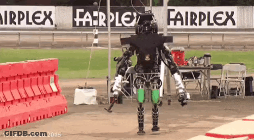 Fairplex Sign Behind Robot On Race Track GIF