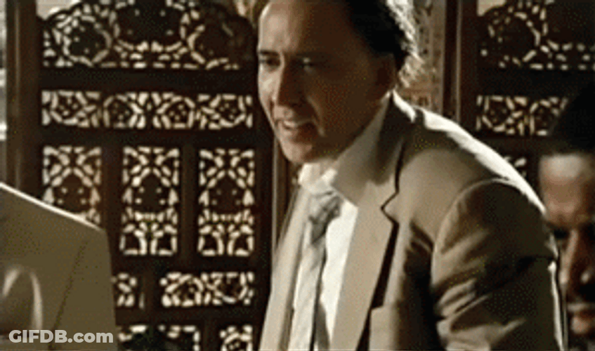 Fake Smile Nicolas Cage GIF