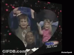 Family In Heart Frame Metro Kiss Cam GIF