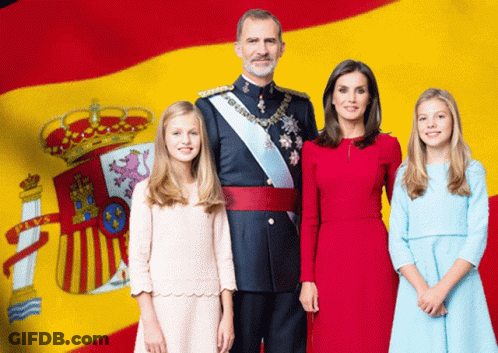 Family Posing In Front Of Spanish Flag GIF