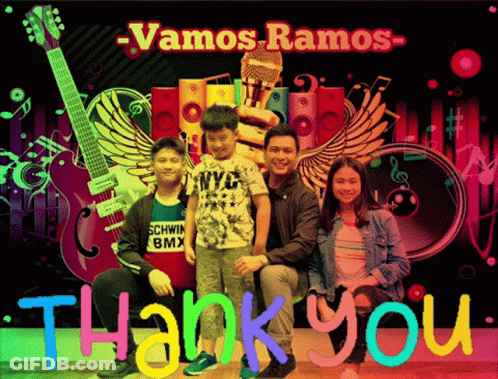 Family Posing In Front Of Vamos Ramos Poster GIF