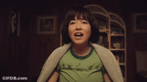 Family Sitting At Table With Food Plates GIF