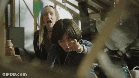 Family Sitting At Table With Plates Of Food GIF