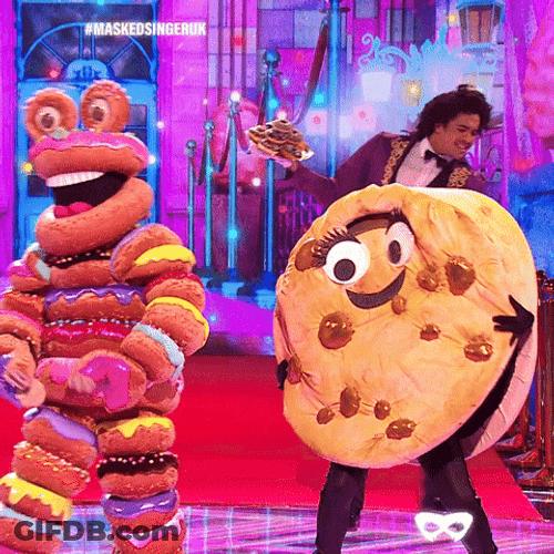 Famous Amos Cookie Mascot Dancing On Stage GIF