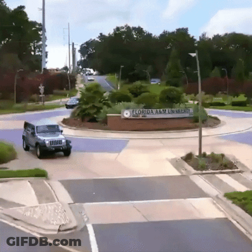 Famu Sign Featuring Car Passing By GIF