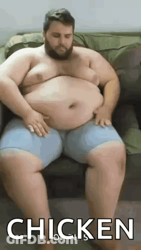 Fat Bearded Man Sitting On Couch GIF