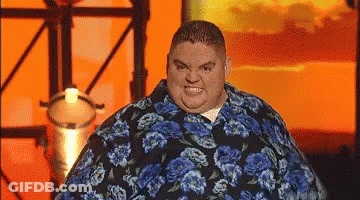 Fat Man In Blue Floral Shirt Making Funny Face GIF