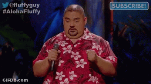 Fat Man In Hawaiian Shirt Holding Microphone Giving Speech GIF