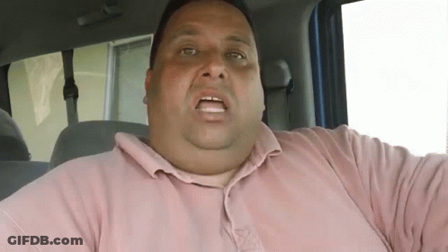 Fat Man In Pink Shirt Sitting In Car GIF