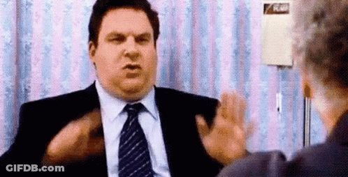 Fat Man In Suit And Tie Talking To Doctor GIF