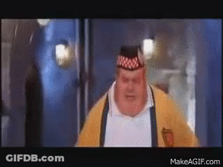 Fat Man In Yellow Sweater And Black Hat GIF