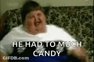 Fat Man Sitting On Couch With Mouth Open GIF