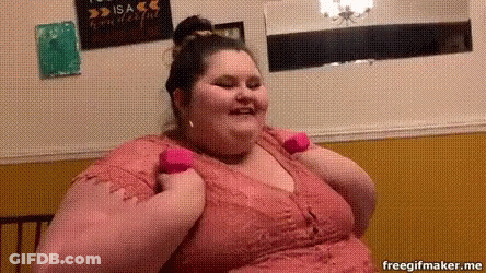 Fat Woman In Pink Dress Holding Pink Dumbbell GIF