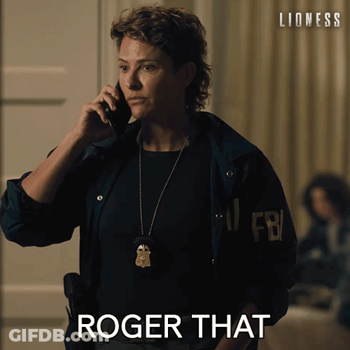 FBI Woman Saying Roger That On Phone GIF
