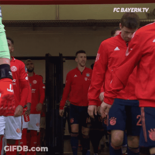 FC Bayern.Tv Soccer Players In Red Jackets Blue Shorts GIF