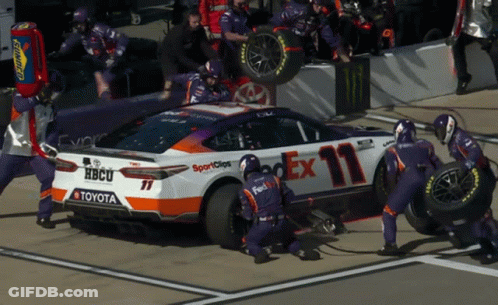 FedEx Race Car Worked On By Mechanics GIF