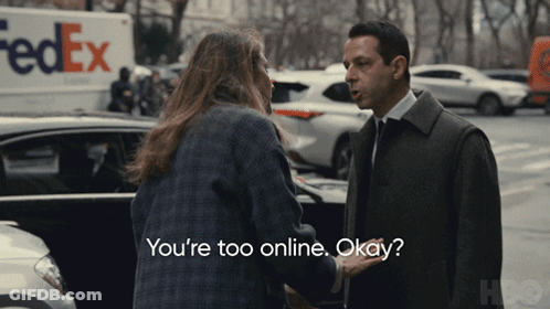 FedEx Truck Behind Man And Woman GIF