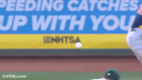 Feeding Catches Up With You Sign Behind Baseball Player GIF