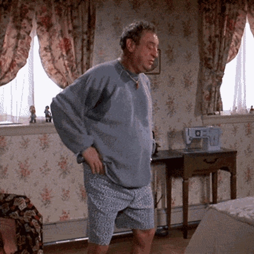 Feeling My Back Rodney Dangerfield GIF