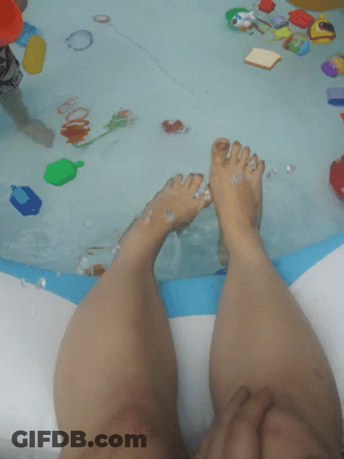 Feet In An Inflatable Pool GIF