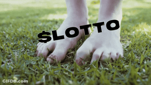 Feet With Lotto On Grass GIF