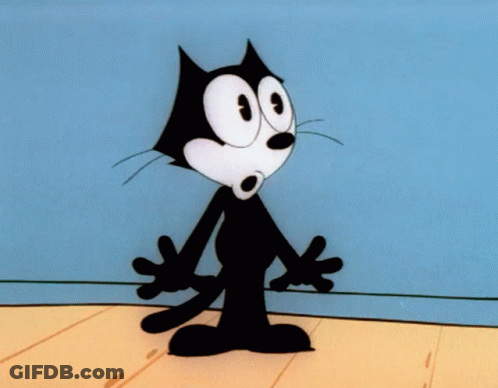 Felix The Cat Standing On A Wooden Floor GIF